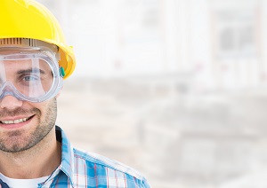 worker wearing eye and head protection | prepare house for pressure washing services