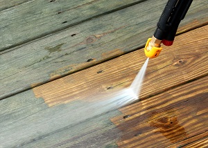 pressure washing wooden deck close up | how to power wash a deck